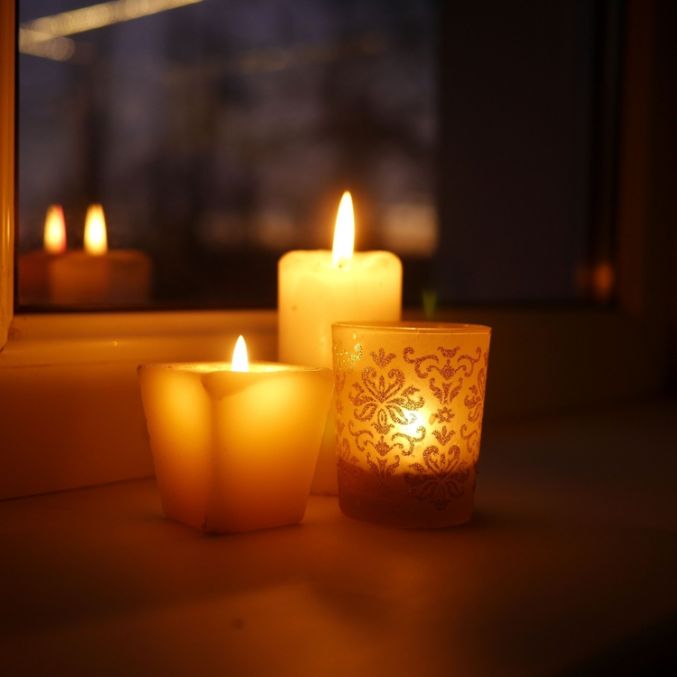 Shutterstock image of candle COVID vigil