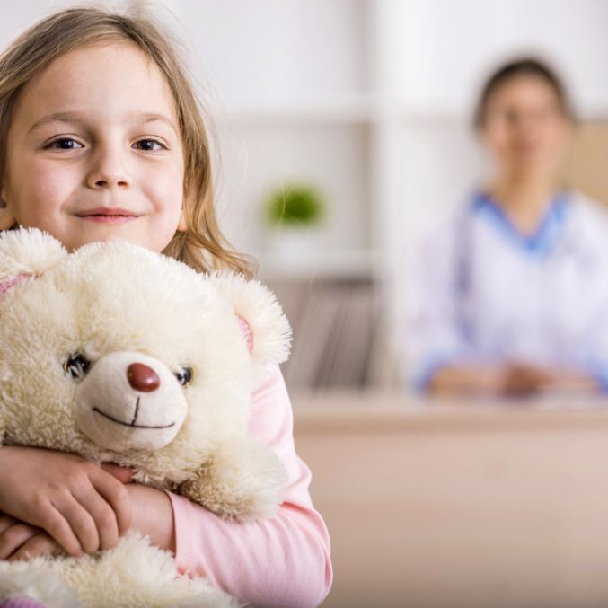 Shutterstock image of girl with bear